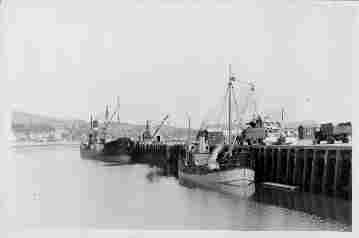 Campbelltown harbour in late 1950's, showing the Lady Isle (Ex VIC 9) in the foreground, and a larger steam coaster in the background. Photo by Capt. Peter Herbert.